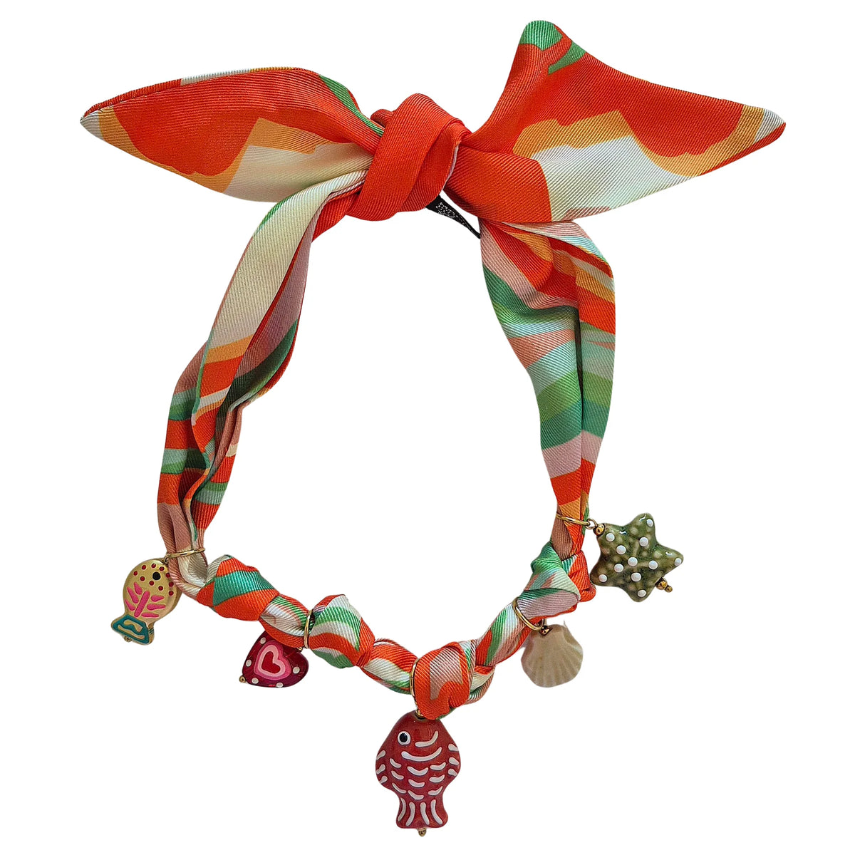 A colorful silk beaded necklace with sea-themed charms, including a red fish, starfish, shell, and heart.